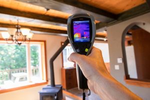 Bradford home inspector using infrared thermal vision for cold spots in home